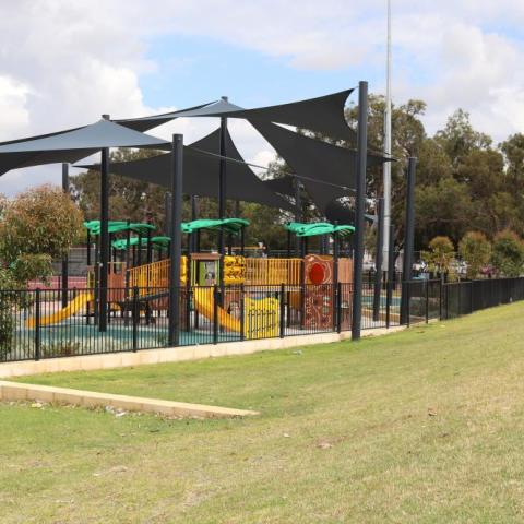 Playground equipment protected by the sun with shade sails